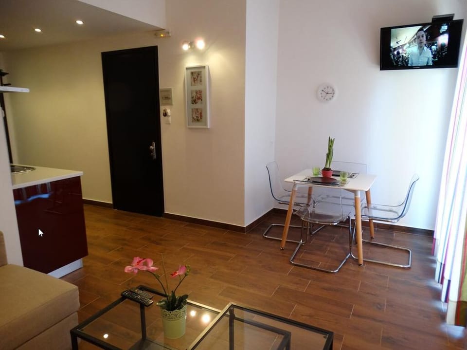 Apartment, 1 Bedroom | Living area | Flat-screen TV
