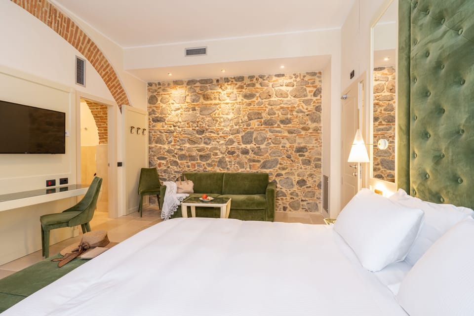 Deluxe Room, Balcony, Sea View | Frette Italian sheets, premium bedding, down comforters, in-room safe