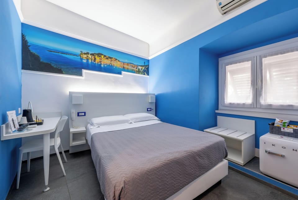 Basic Double Room, 1 Double Bed | Minibar, desk, laptop workspace, blackout drapes