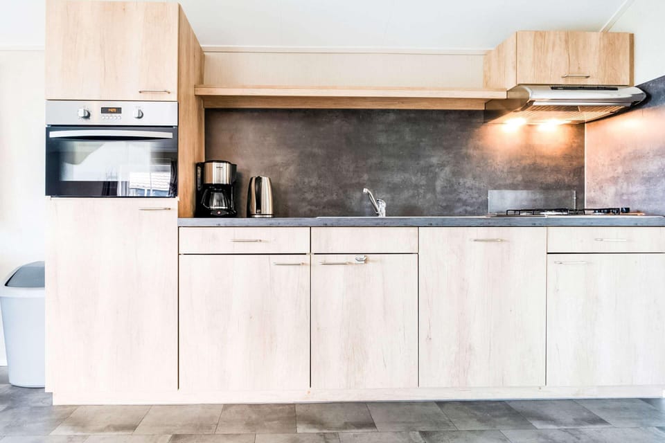 Chalet | Private kitchen | Coffee/tea maker, microwave, oven