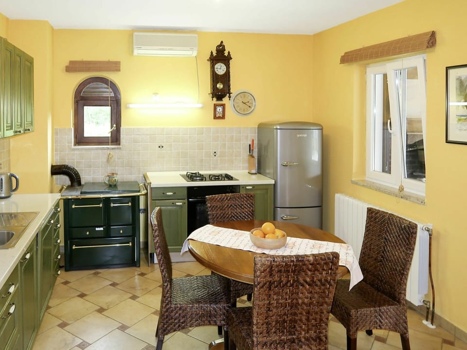 Room, Property, Furniture, Countertop, Kitchen, Building, Floor, Interior Design, Yellow, House