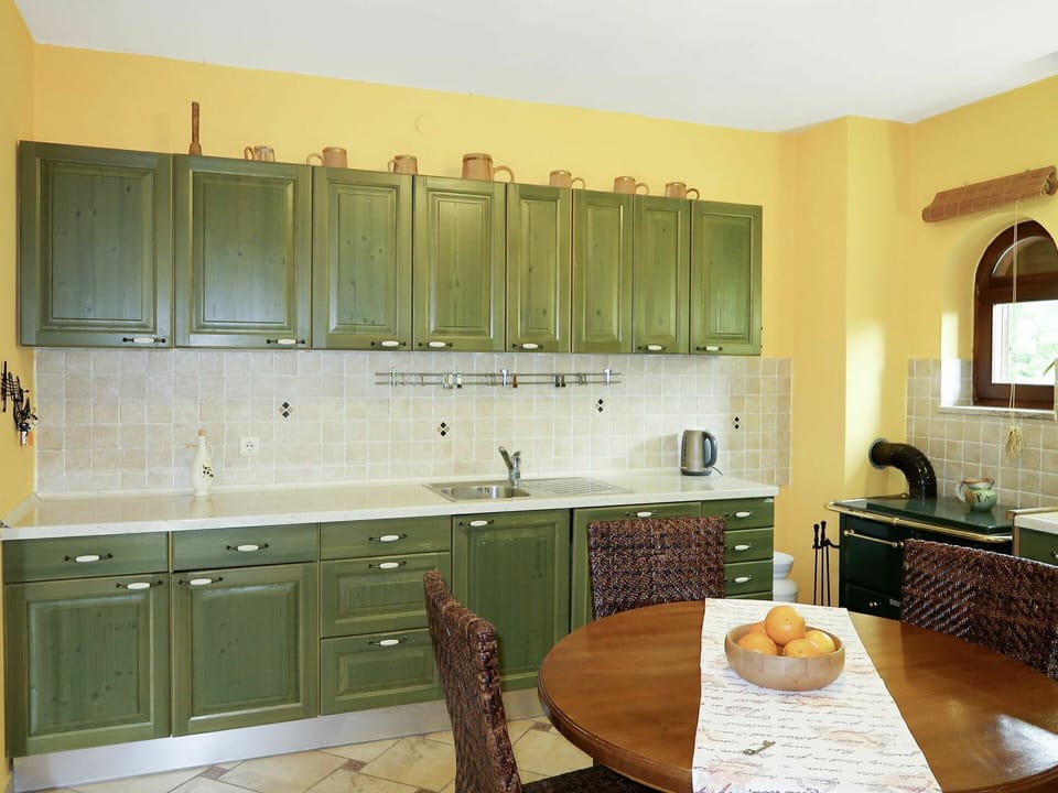 Countertop, Room, Furniture, Kitchen, Cabinetry, Property, Interior Design, Green, Tile, Yellow