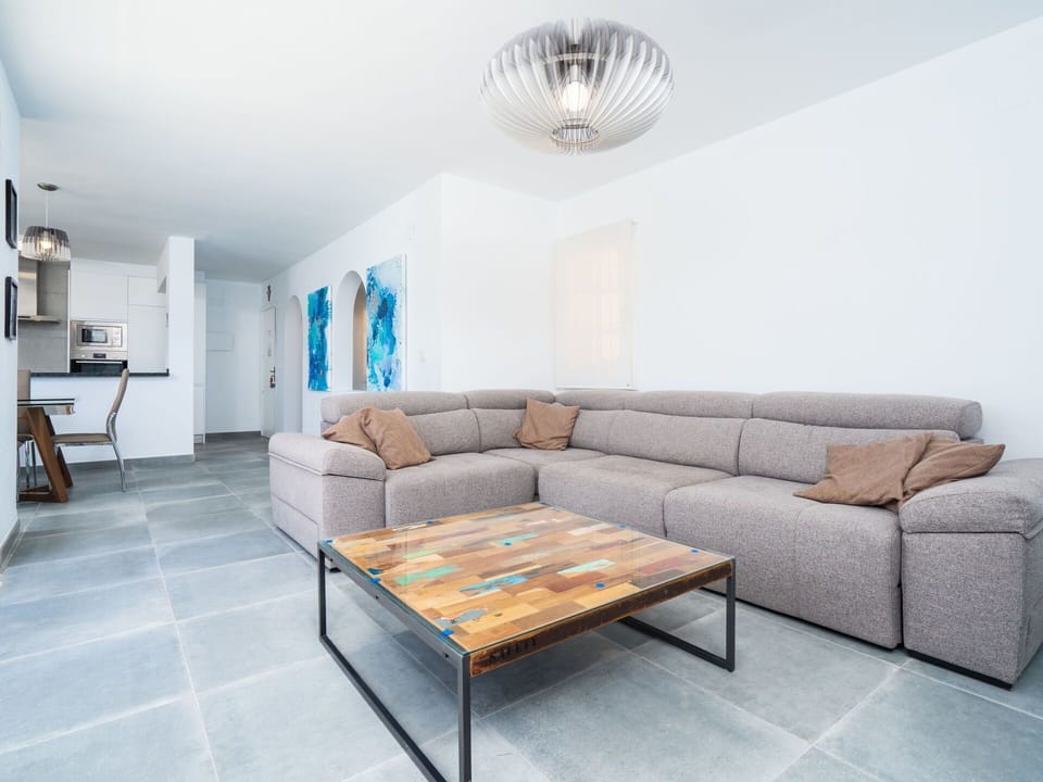 Furniture, Room, Living Room, Interior Design, Property, Floor, Coffee Table, Table, Wall, Couch