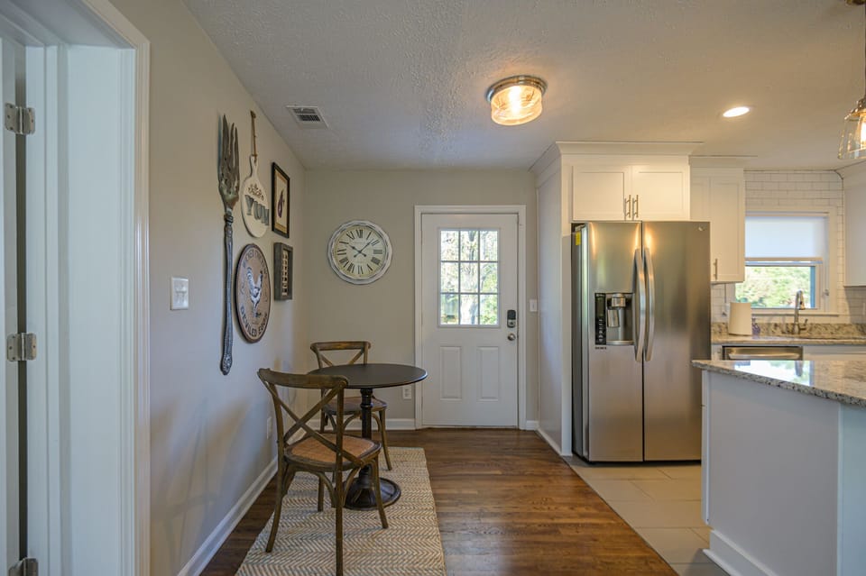 Open floor plan eat in kitchen, remodeled with stainless steel appliances.