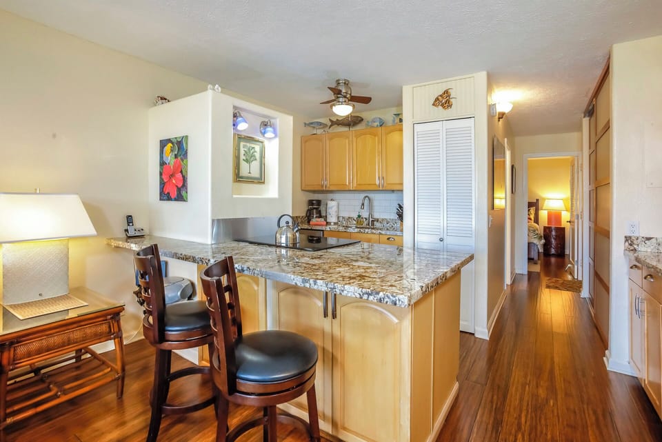 Seating for Two at the Breakfast Bar with Granite Countertops