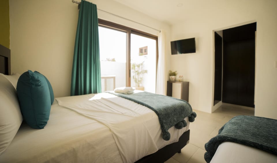 Executive Studio, 2 Double Beds | Down comforters, blackout drapes, iron/ironing board, free WiFi