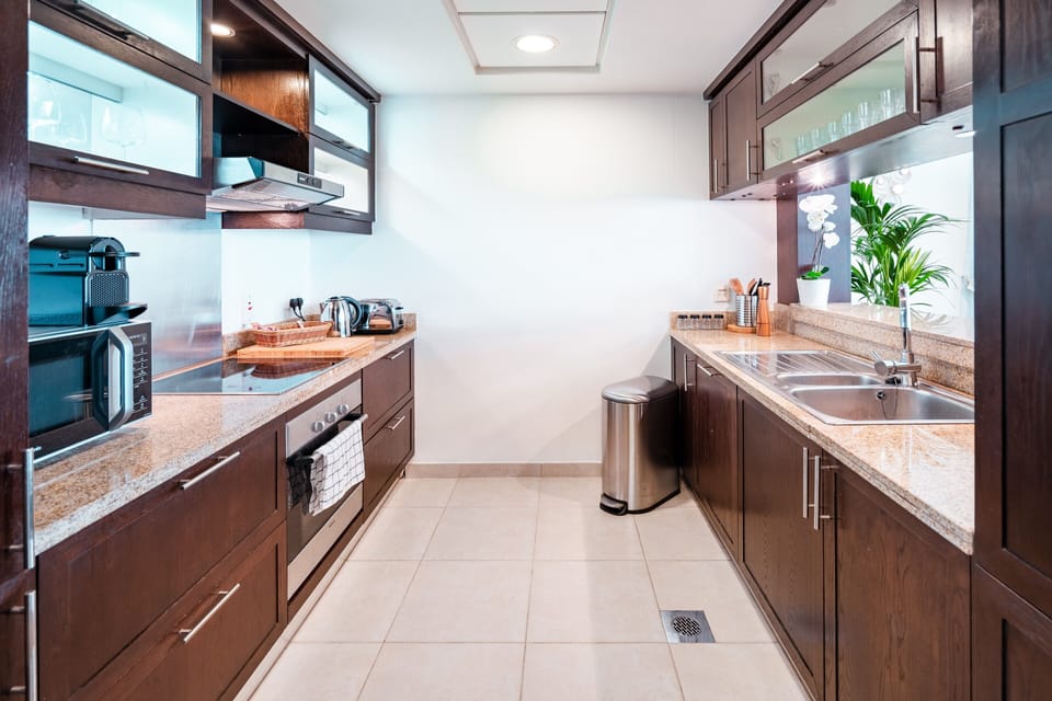 Deluxe Apartment, 2 Bedrooms | Private kitchenette | Full-size fridge, microwave, oven, stovetop