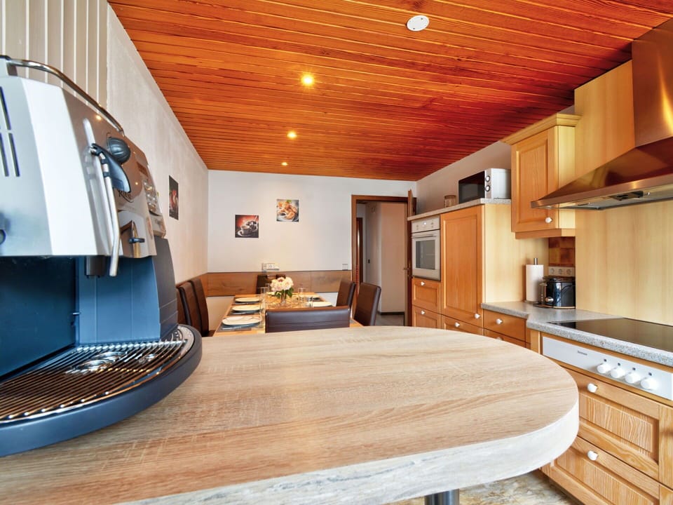 Furniture, Cabinetry, Table, Property, Countertop, Wood, Lighting, Comfort, Building, Interior Design