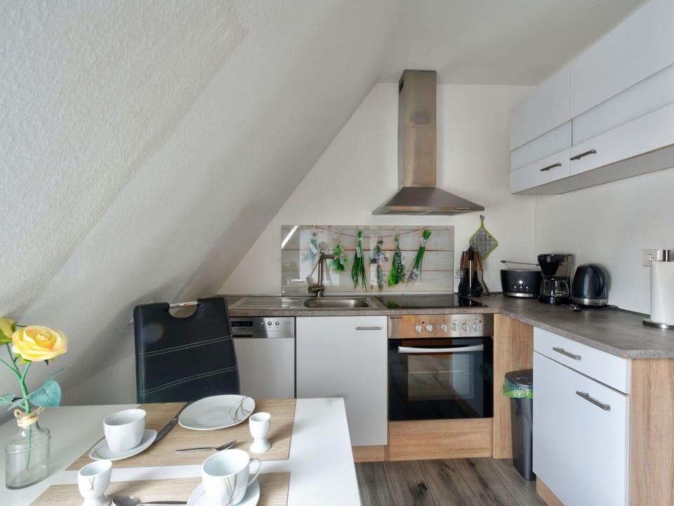 Cabinetry, Countertop, Furniture, Building, Kitchen Appliance, Dishware, Tableware, Coffee Cup, Sink, Wood