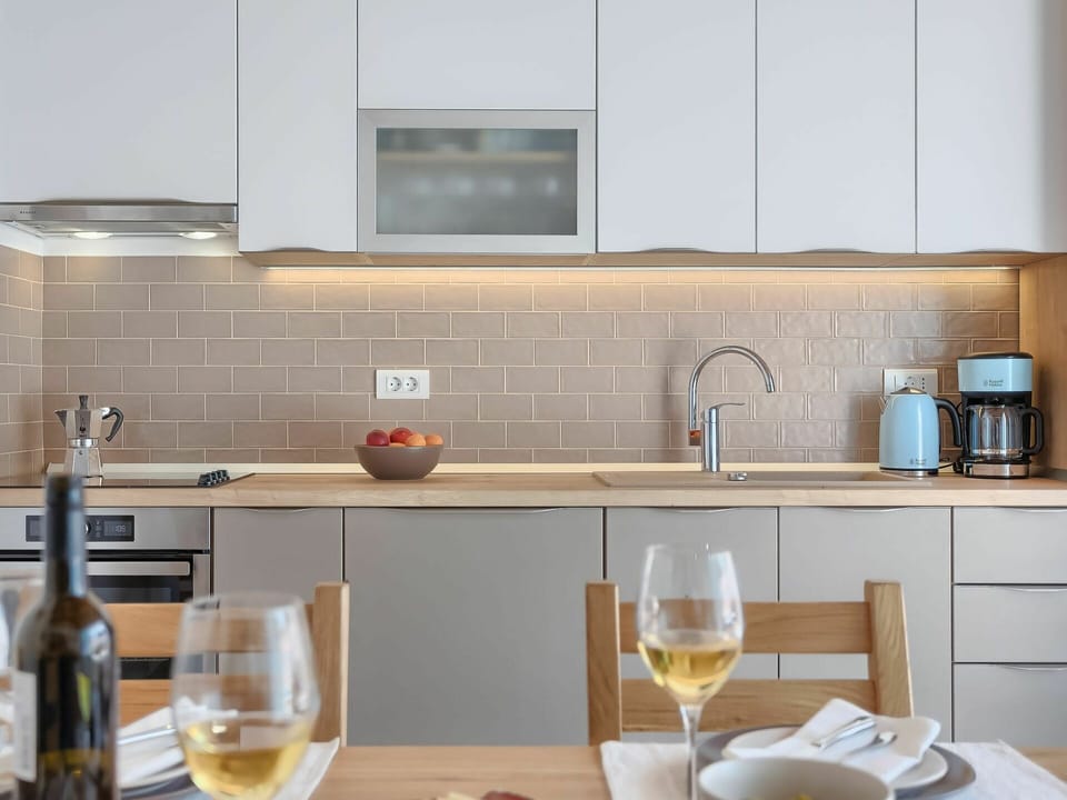 Tableware, Cabinetry, Countertop, Property, Furniture, Kitchen Sink, Tap, Drinkware, Sink, Kitchen Stove