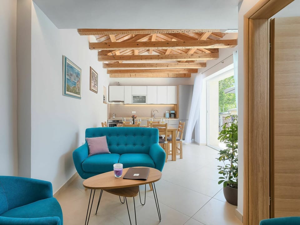 Furniture, Couch, Property, Table, Blue, Interior Design, Picture Frame, Wood, Comfort, Building