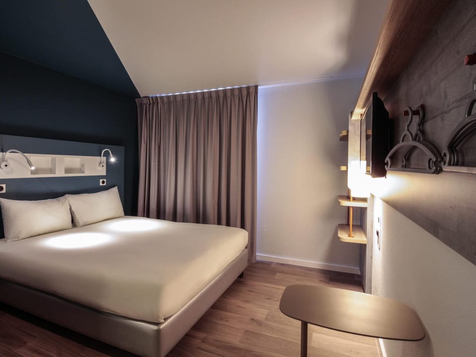 Blackout drapes, soundproofing, iron/ironing board, free WiFi