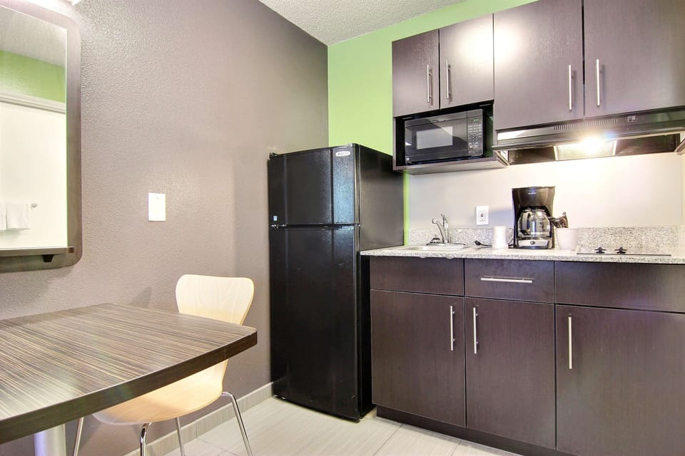 Standard Room, 1 Queen Bed, Accessible, Non Smoking | Private kitchen | Fridge, microwave, coffee/tea maker