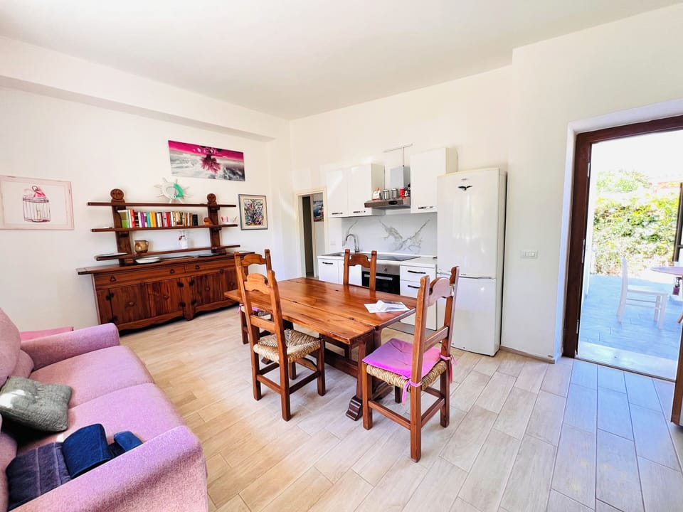 Apartment, 2 Bedrooms | Living area | 22-inch flat-screen TV with cable channels