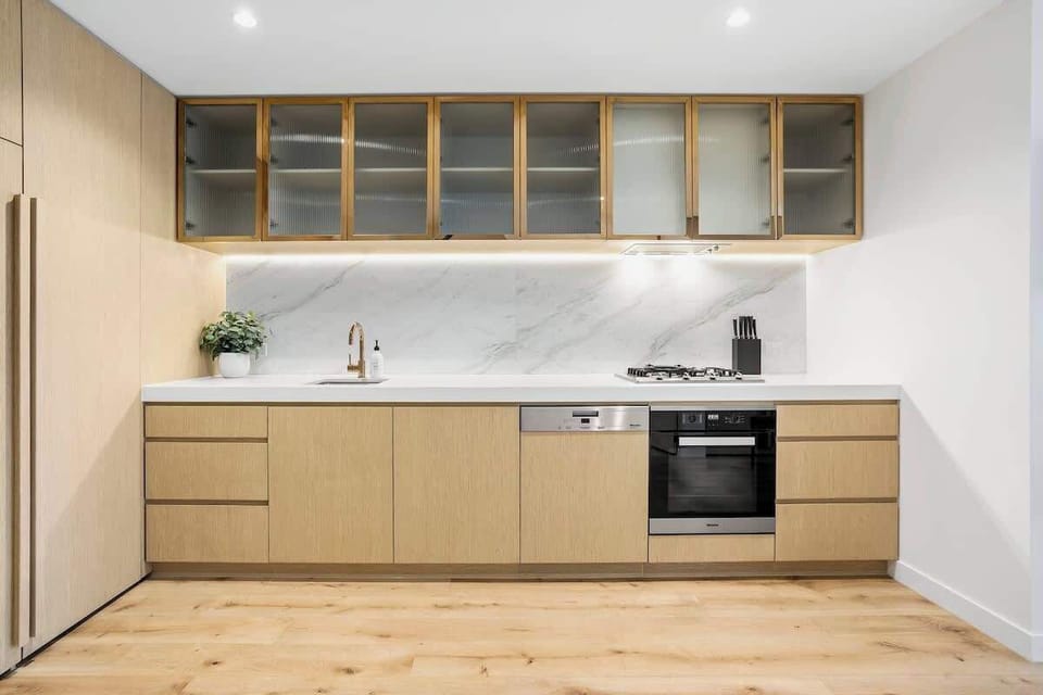 Spacious kitchen with oven, gas stovetop and dishwasher