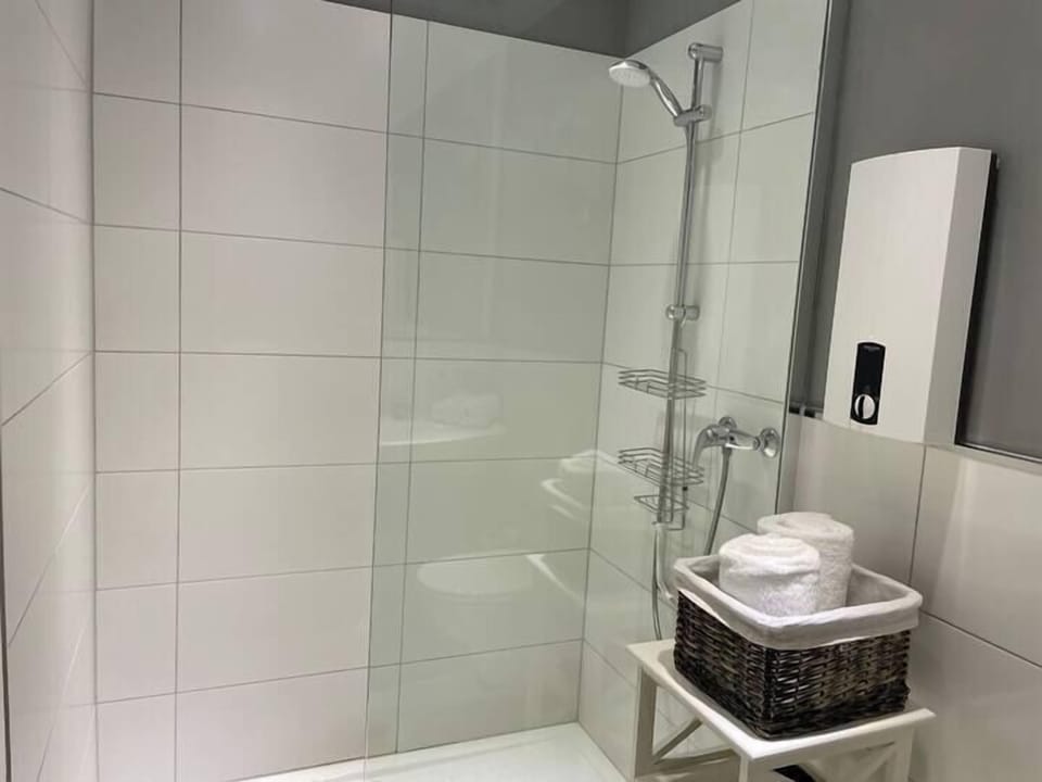 Deluxe Condo | Bathroom | Free toiletries, hair dryer, towels, soap
