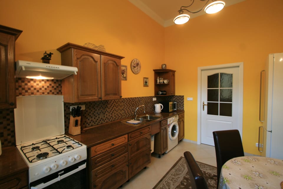 Apartment | Private kitchen | Full-size fridge, microwave, oven, stovetop