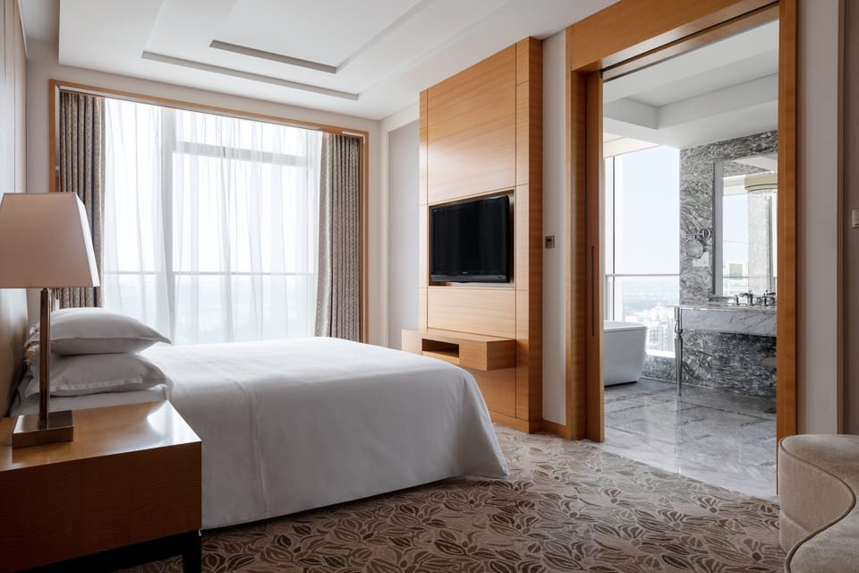 Suite, 1 Bedroom | 1 bedroom, down comforters, pillowtop beds, in-room safe