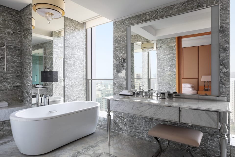 Suite, 1 Bedroom | Bathroom | Deep soaking tub, rainfall showerhead, eco-friendly toiletries