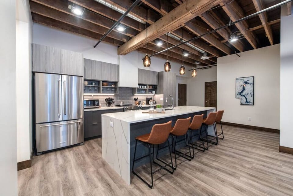 High exposed ceilings reveals the rustic charm of this historic building