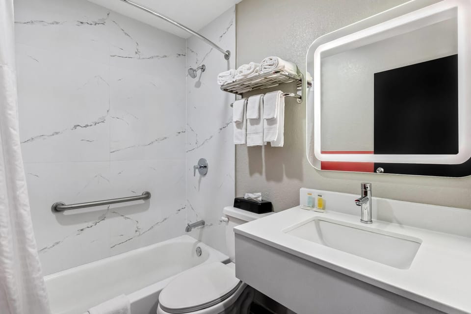 Combined shower/tub, eco-friendly toiletries, towels, soap