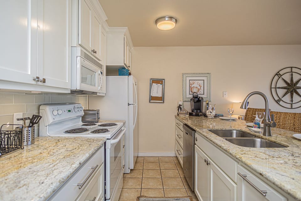 Kitchen fully stocked with full size appliances and everything a "Home Chef" needs to make a meal in