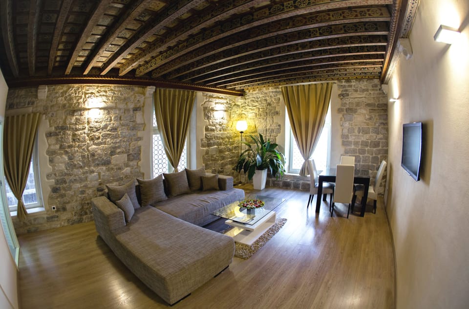 Deluxe Apartment, One Bedroom, View on Imperial Square Peristil | Living area | 110-cm LCD TV with digital channels, TV, pay movies