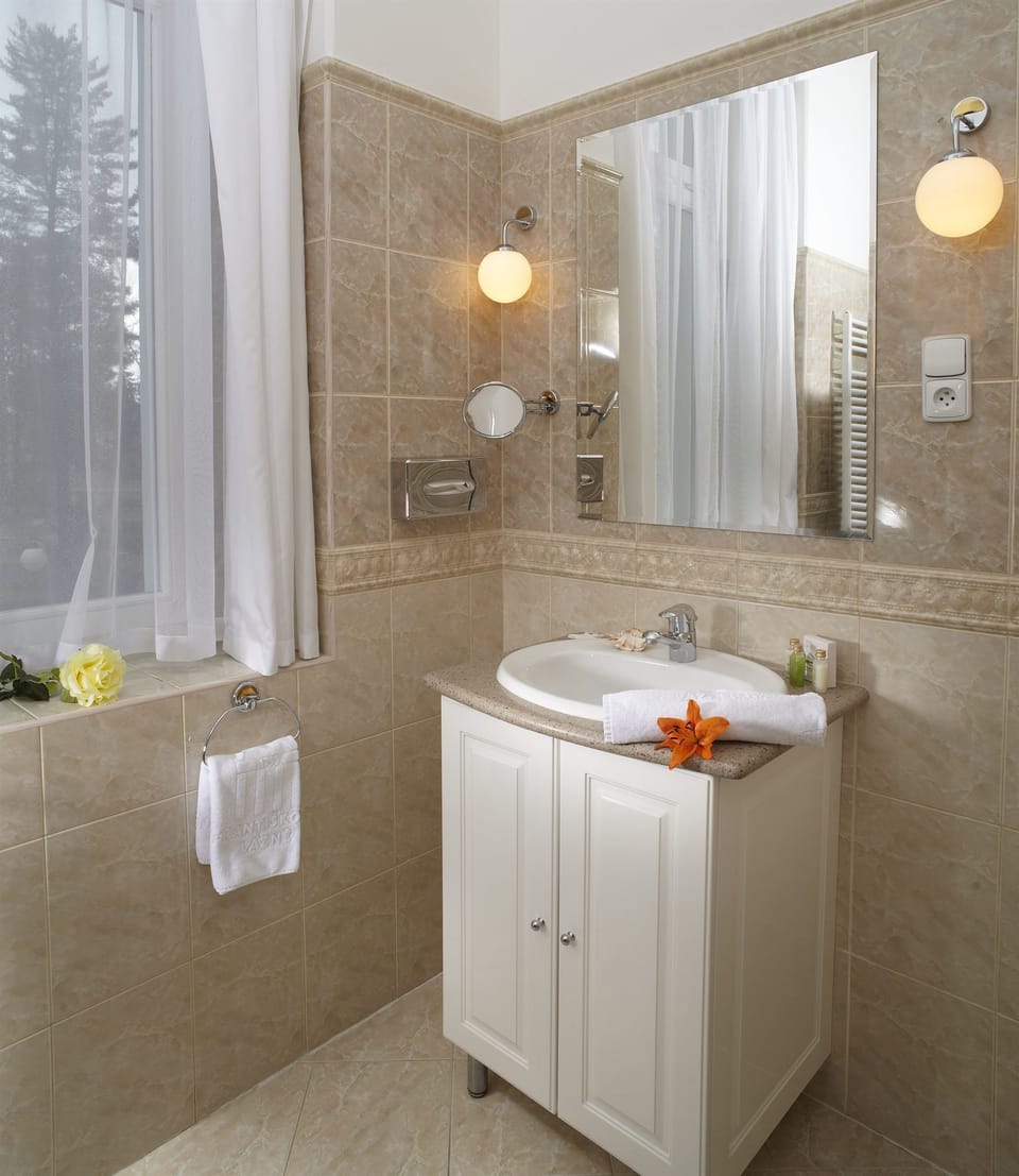 Shower, free toiletries, hair dryer, bathrobes