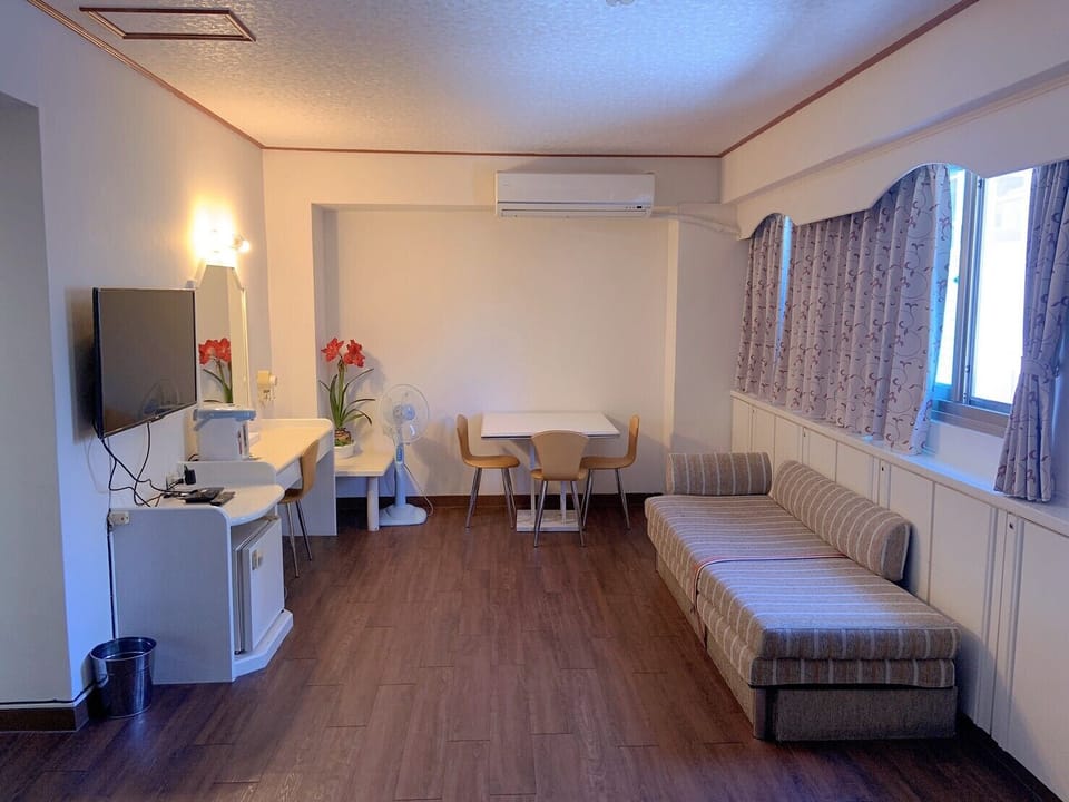 Family Room, 2 Double Beds | Desk, blackout drapes, free WiFi, bed sheets