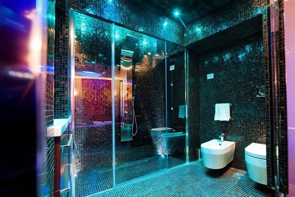 Deluxe Double Room | Bathroom | Rainfall showerhead, designer toiletries, hair dryer, bathrobes