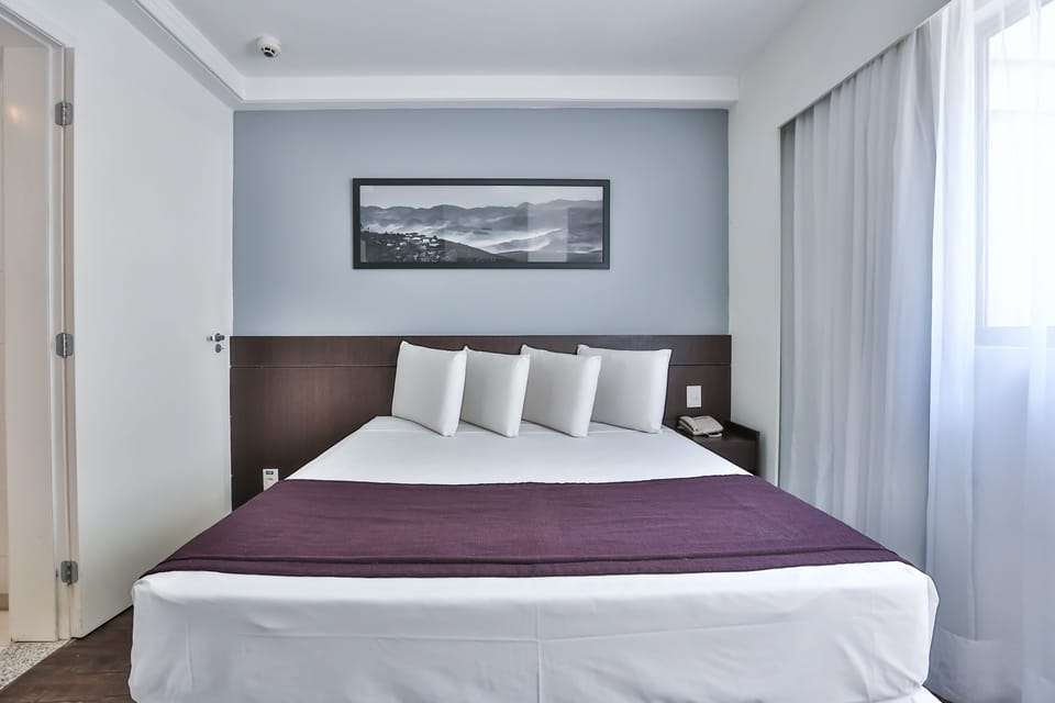 Quarto Casal Superior  | In-room safe, blackout drapes, free WiFi, bed sheets