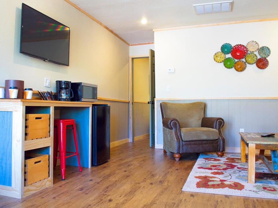 Suite, 1 Bedroom (Two Double Beds) | Living room | TV