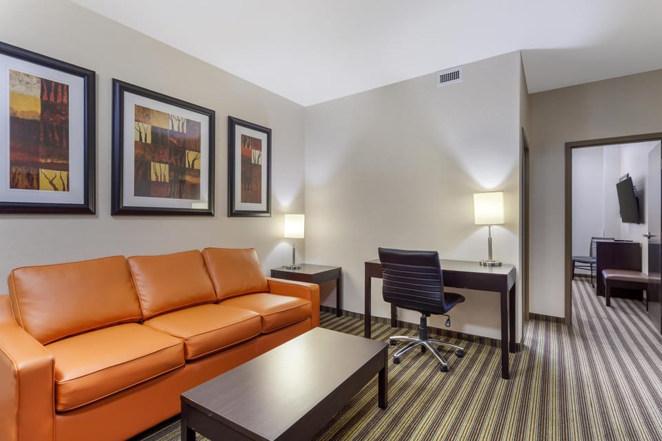 Executive Suite, 1 King Bed, Non Smoking | Desk, laptop workspace, iron/ironing board, free WiFi