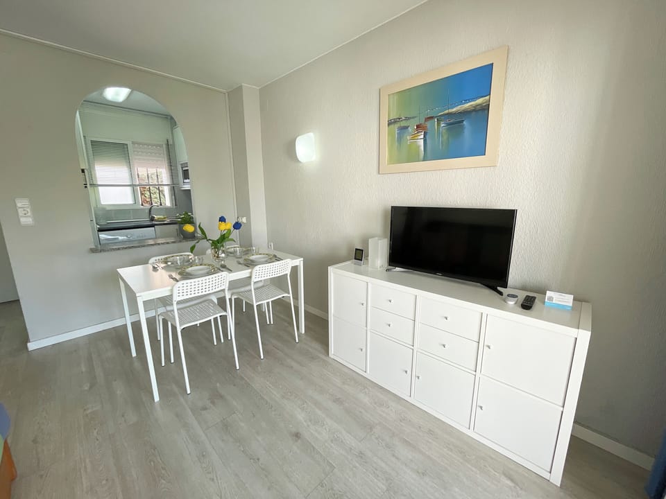 Apartment, 1 Bedroom (4 people) | Living area | 21-inch TV with digital channels