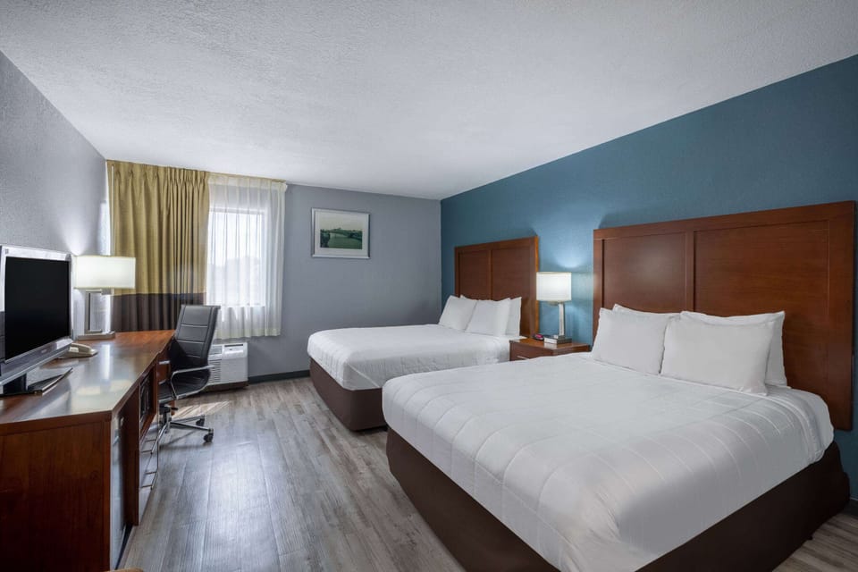 Room, 2 Double Beds, Smoking | Desk, laptop workspace, blackout drapes, iron/ironing board