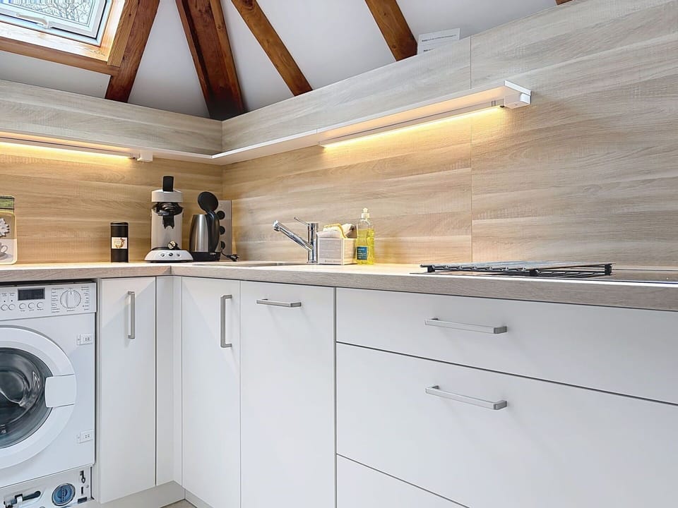 Flooring, Interior Design, Wood, Countertop, Kitchen, Floor, Ceiling, Major Appliance, Cabinetry, Kitchen Appliance