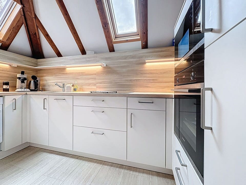 Kitchen, Wood, Flooring, Countertop, Interior Design, Kitchen Appliance, Cabinetry, Floor, Ceiling, Home