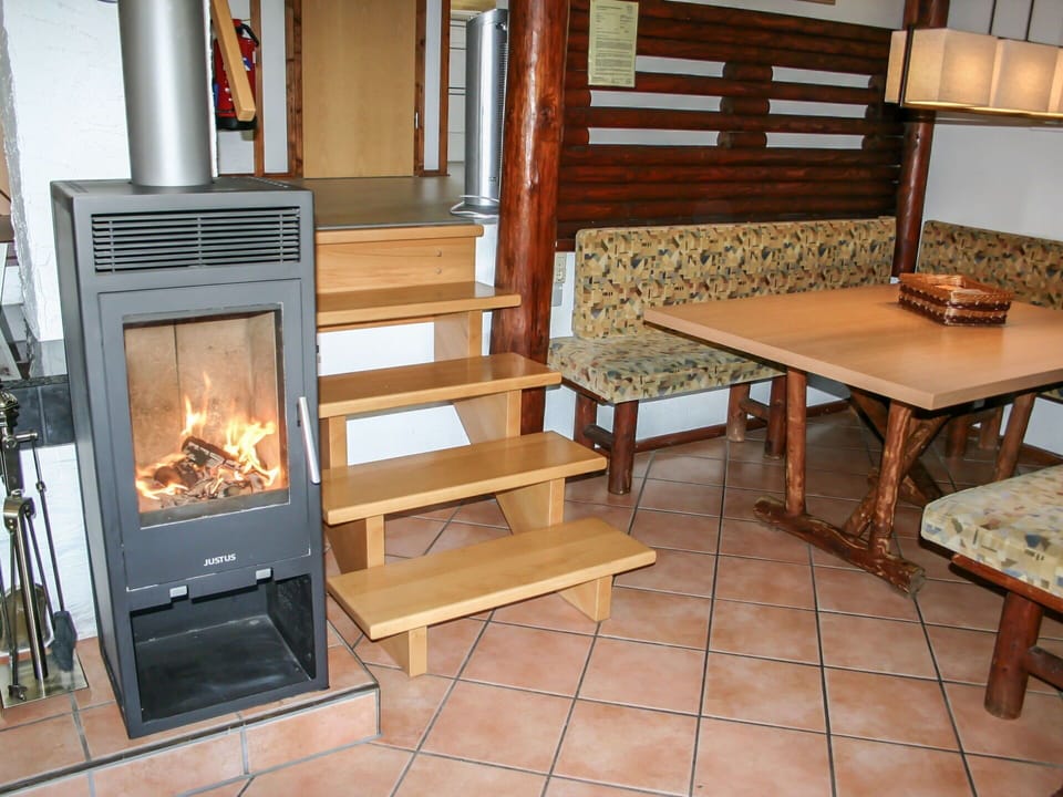 Hearth, Fireplace, Heat, Room, Property, Furniture, Wood-Burning Stove, Hardwood, Wood, Table
