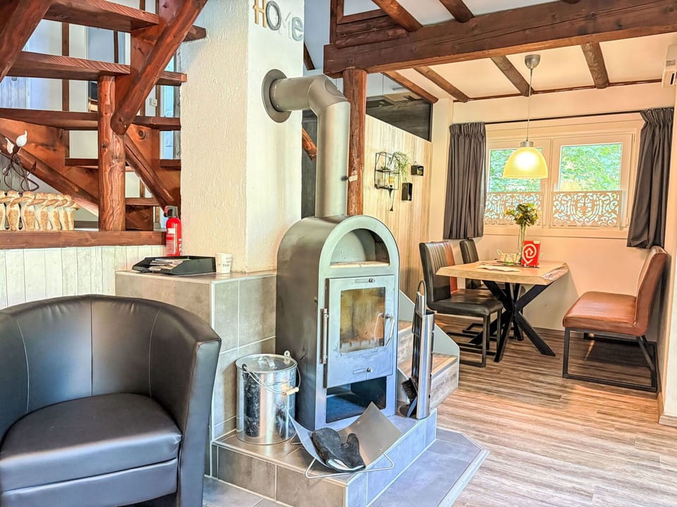 Furniture, Wood, Interior Design, Room, Home, Living Room, Ceiling, Chair, Hardwood, Cottage