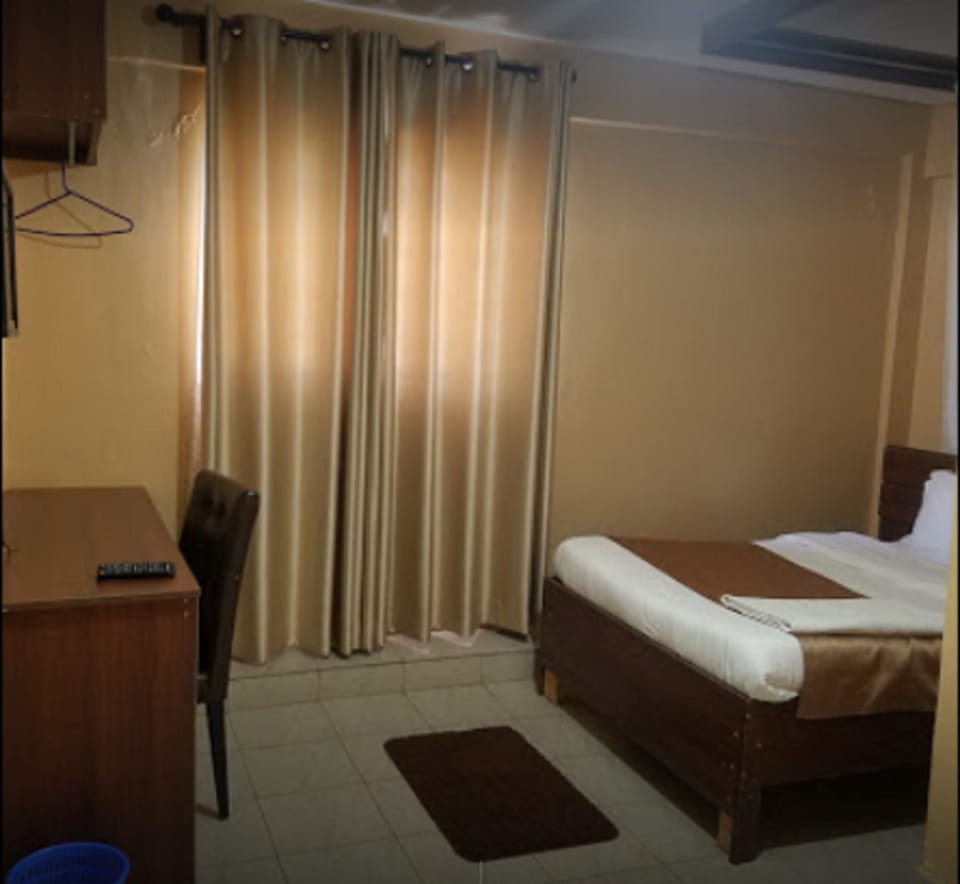 Standard Room | Desk, bed sheets