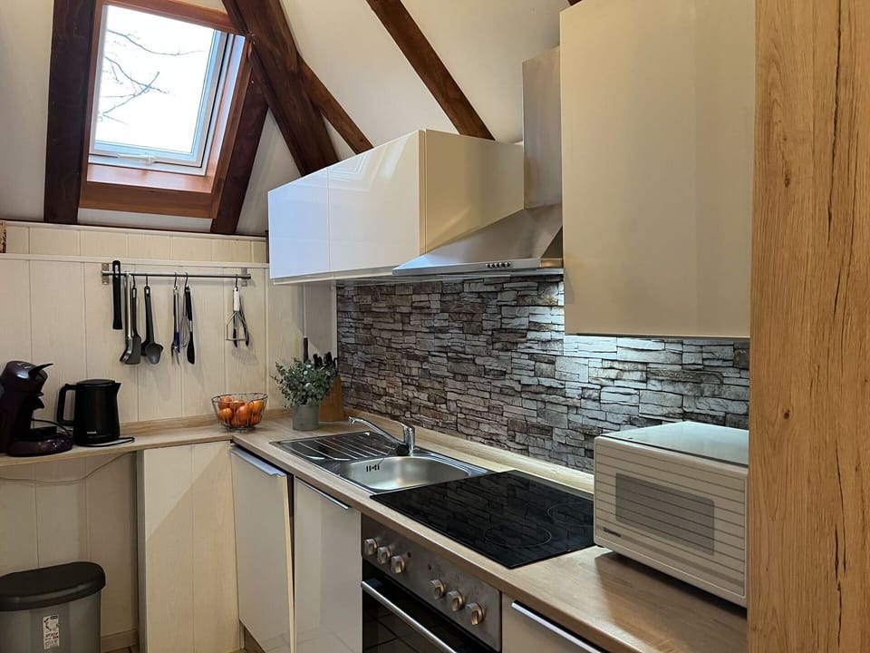 Countertop, Cabinetry, Property, Furniture, Building, Kitchen Stove, Kitchen, Drawer, Wood, Interior Design