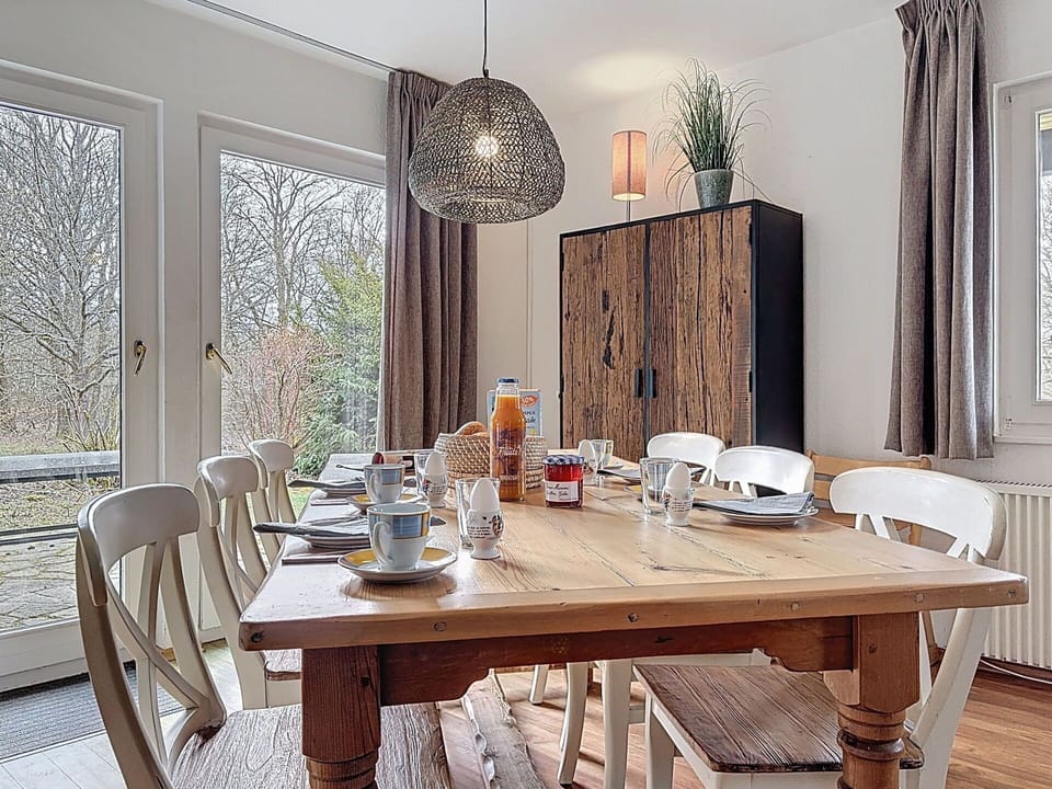 Furniture, Interior Design, Dining Room, Flooring, Chair, Table, Wood, Kitchen & Dining Room Table, Chandelier, Ceiling