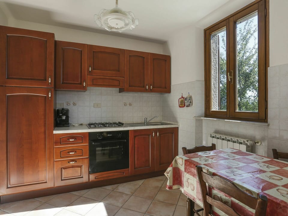 Furniture, Cabinetry, Room, Countertop, Property, Kitchen, Building, Floor, Interior Design, Drawer