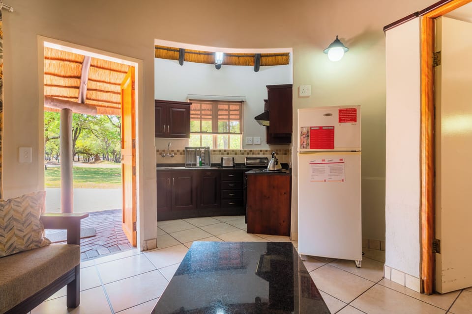 Bungalow, 2 Bedrooms, Accessible | Living area | Flat-screen TV, foosball, table tennis, books
