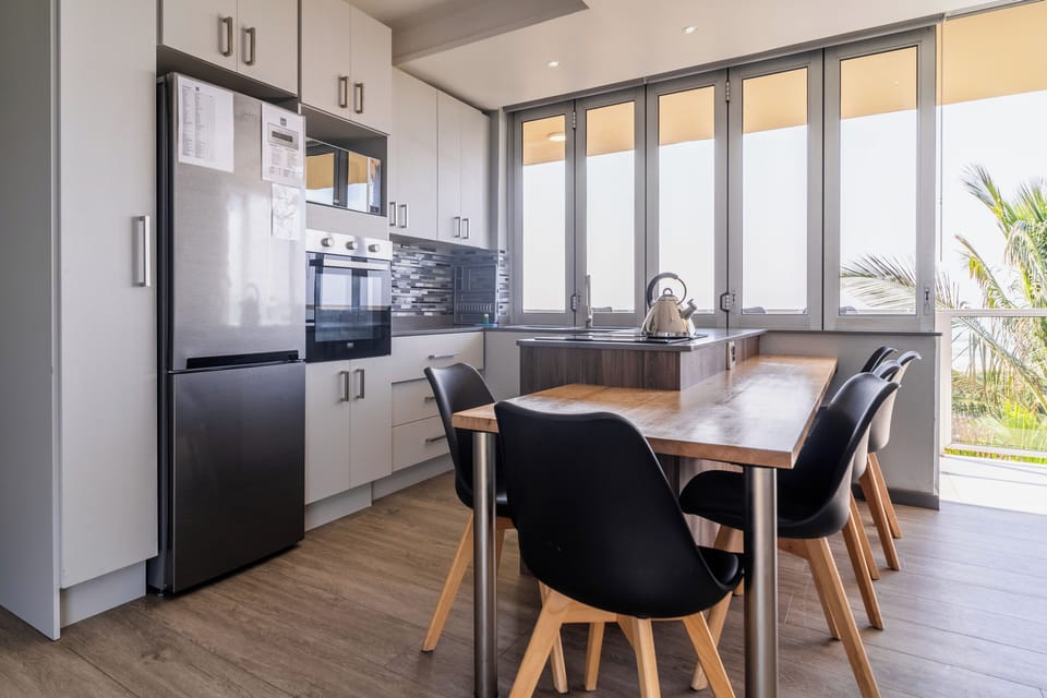 6 Sleeper Upgraded Flat with Balcony (26) | Private kitchen | Full-size fridge, microwave, oven, stovetop