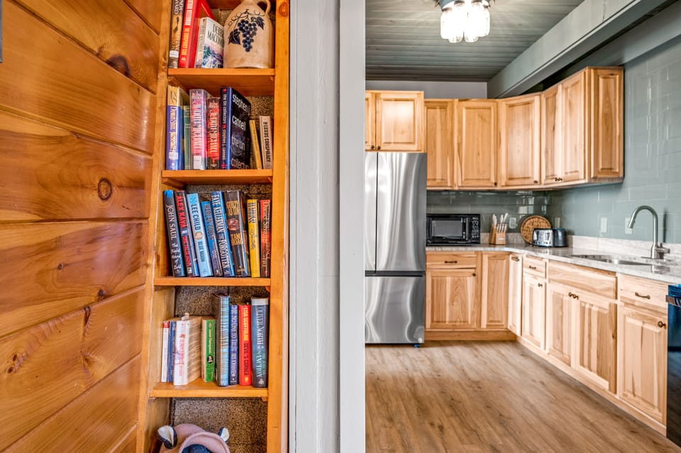 Enjoy all this cabin has to offer with many custom touches like this bookshelf!