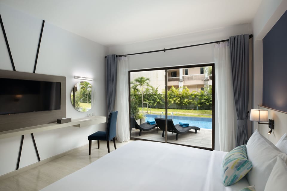 Deluxe Room, 2 Twin Beds, Pool Access | In-room safe, desk, laptop workspace, iron/ironing board (on request)