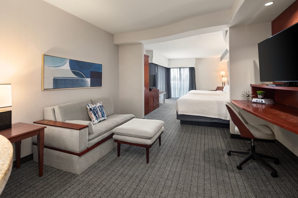 Premium bedding, down comforters, pillowtop beds, desk