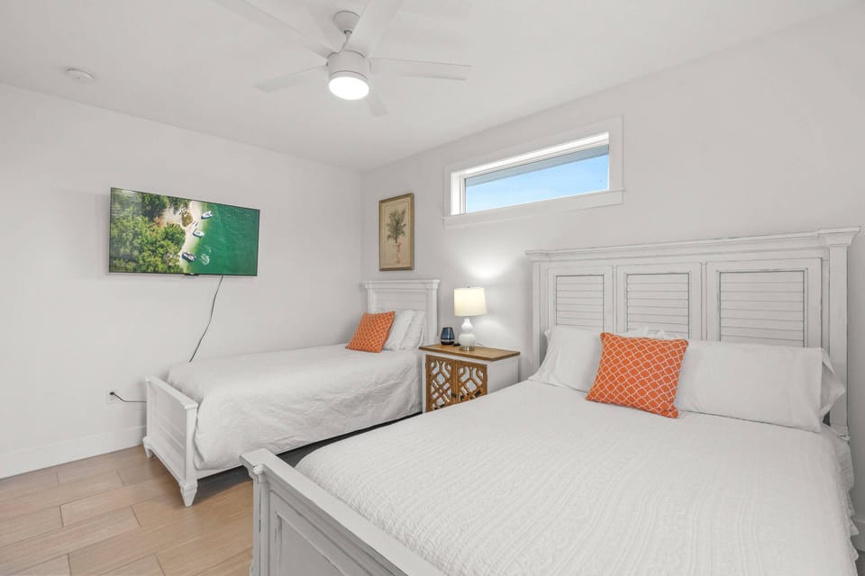 There is a mounted TV in the guest bedroom to watch your favorite TV show or sports game.