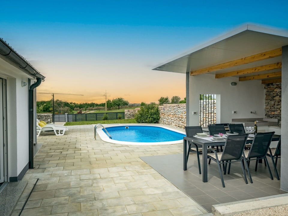 Furniture, Outdoor Furniture, Swimming Pool, Chair, Home, Shade, Composite Material, Outdoor Table, Patio, Deck